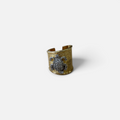Jakris gold plated ear cuff featuring a textured surface and a sparkling zircon stone turtle design.