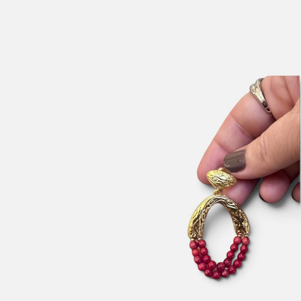 Jakris Rossa statement earring featuring 24k gold-plated textured bronze and multi-strand red coral beads