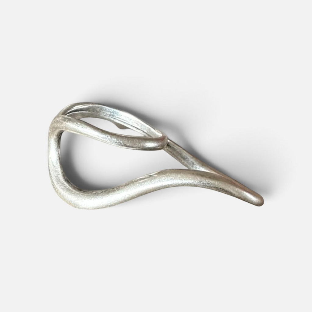 Jakris Reilly gold-plated two-finger ring with a modern, fluid sculptural design on a plain background.