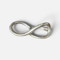 Jakris Reilly gold-plated two-finger ring with a smooth infinity-shaped design on a white background