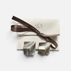 Jakris Noila sculptural silver-tone earrings with a geometric, curved square design and antique finish.