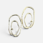Jakris Alara gold plated abstract oval earrings with textured surface and organic asymmetrical design