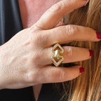 Jakris adjustable gold geometric ring with crystal accents worn on a finger