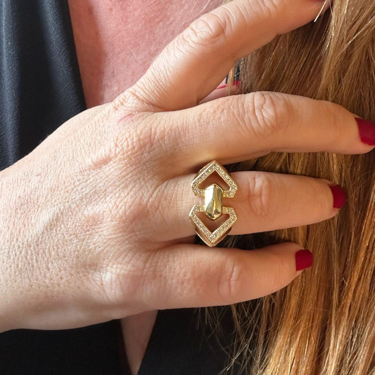 Jakris adjustable gold geometric ring with crystal accents worn on a finger
