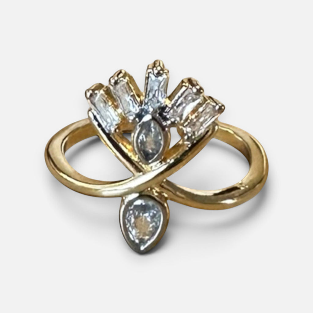 Jakris adjustable gold-tone ring featuring a decorative fan-shaped design with clear baguette and teardrop crystals.