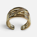 Jakris adjustable gold-tone wide ring featuring a multi-strand band design with sparkling crystal accents.