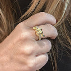 Jakris adjustable gold knot ring featuring sparkling zircon stone details worn on a finger