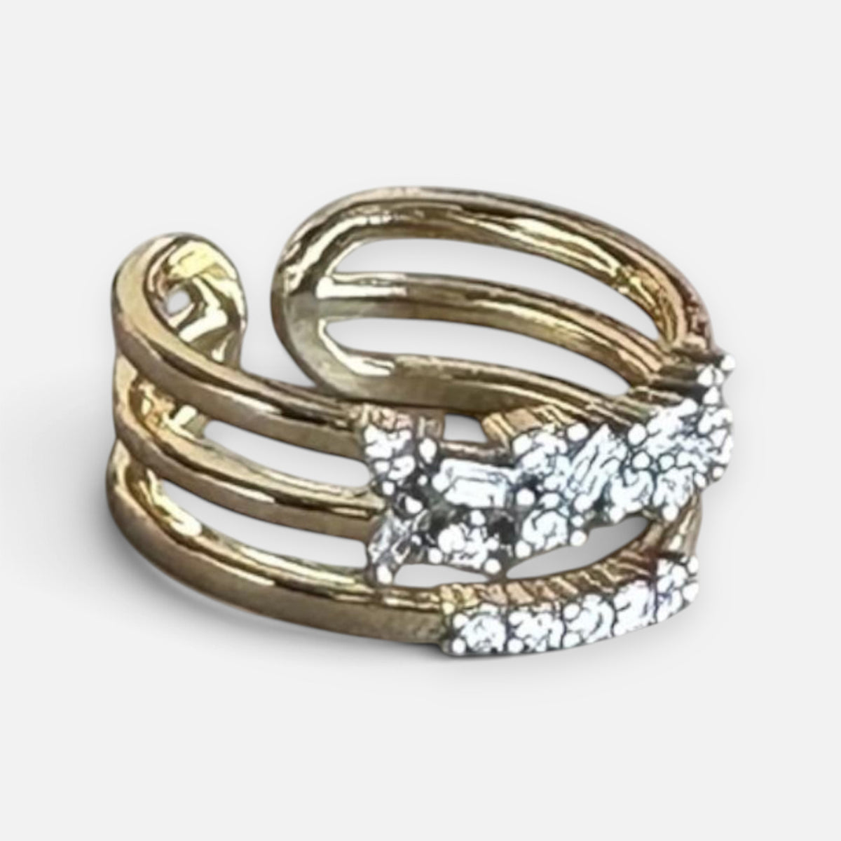Jakris adjustable gold ring with multiple bands and sparkling zircon crystal accents in a modern design
