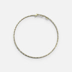 Jakris adjustable thin gold choker necklace with a delicate textured bead design on a white background