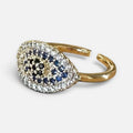 Jakris adjustable gold-tone ring featuring a teardrop-shaped evil eye motif with blue, black, and white zircon stones.