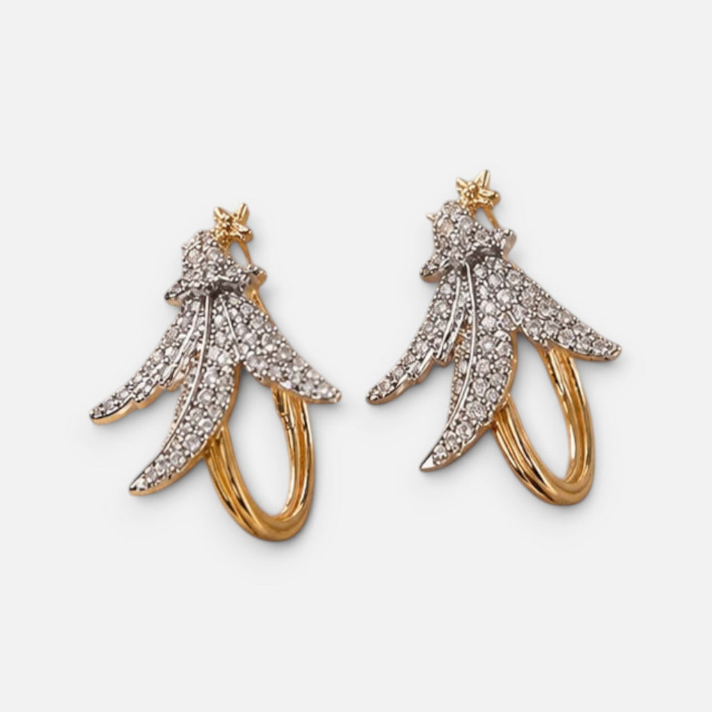 Jakris Anka bird inspired gold hoop earrings featuring sparkling zircon stone encrusted wing designs.