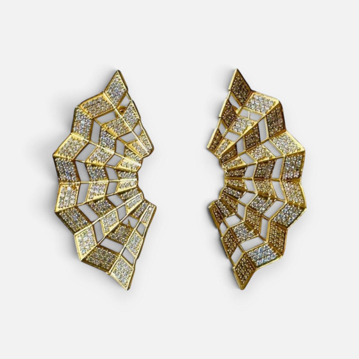 Jakris Art Deco fan-shaped earrings in gold tone with intricate geometric patterns and sparkling zircon stones
