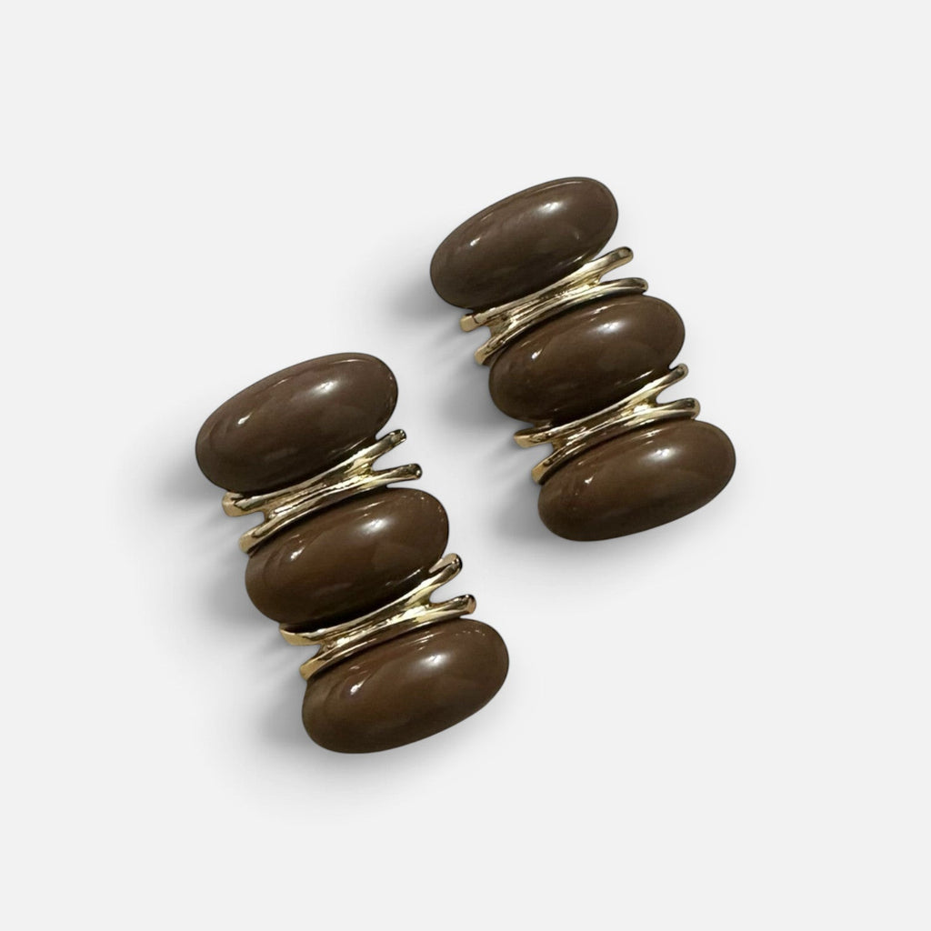 Jakris modern brown earrings featuring stacked oval resin beads with gold-tone metal accents