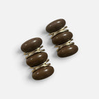 Jakris modern brown earrings featuring stacked oval resin beads with gold-tone metal accents