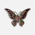 Jakris vintage butterfly brooch featuring shimmering pink textured metal and colorful crystal accents