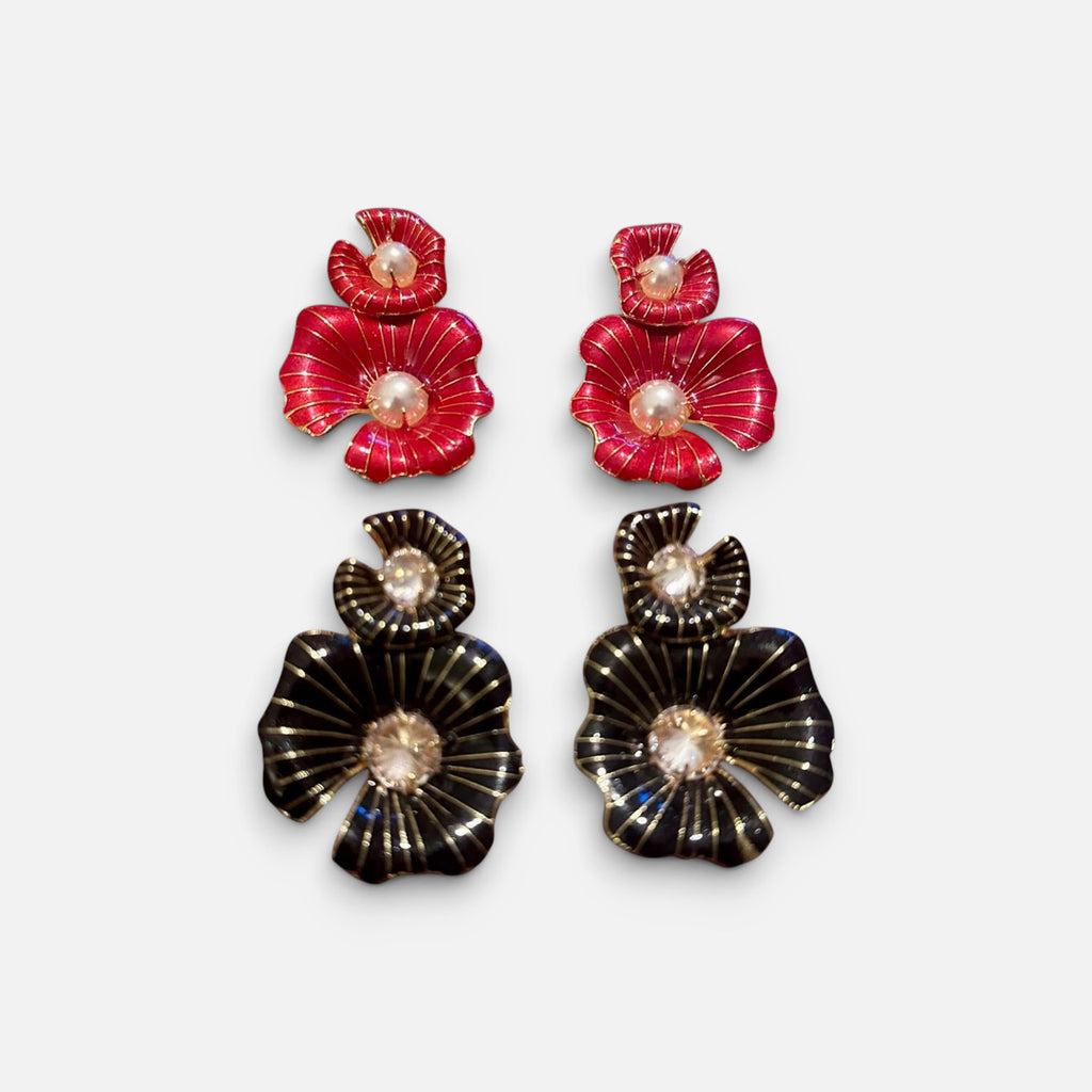 Jakris flower earrings featuring red and black enamel petals with pearl and crystal accents on a white background.
