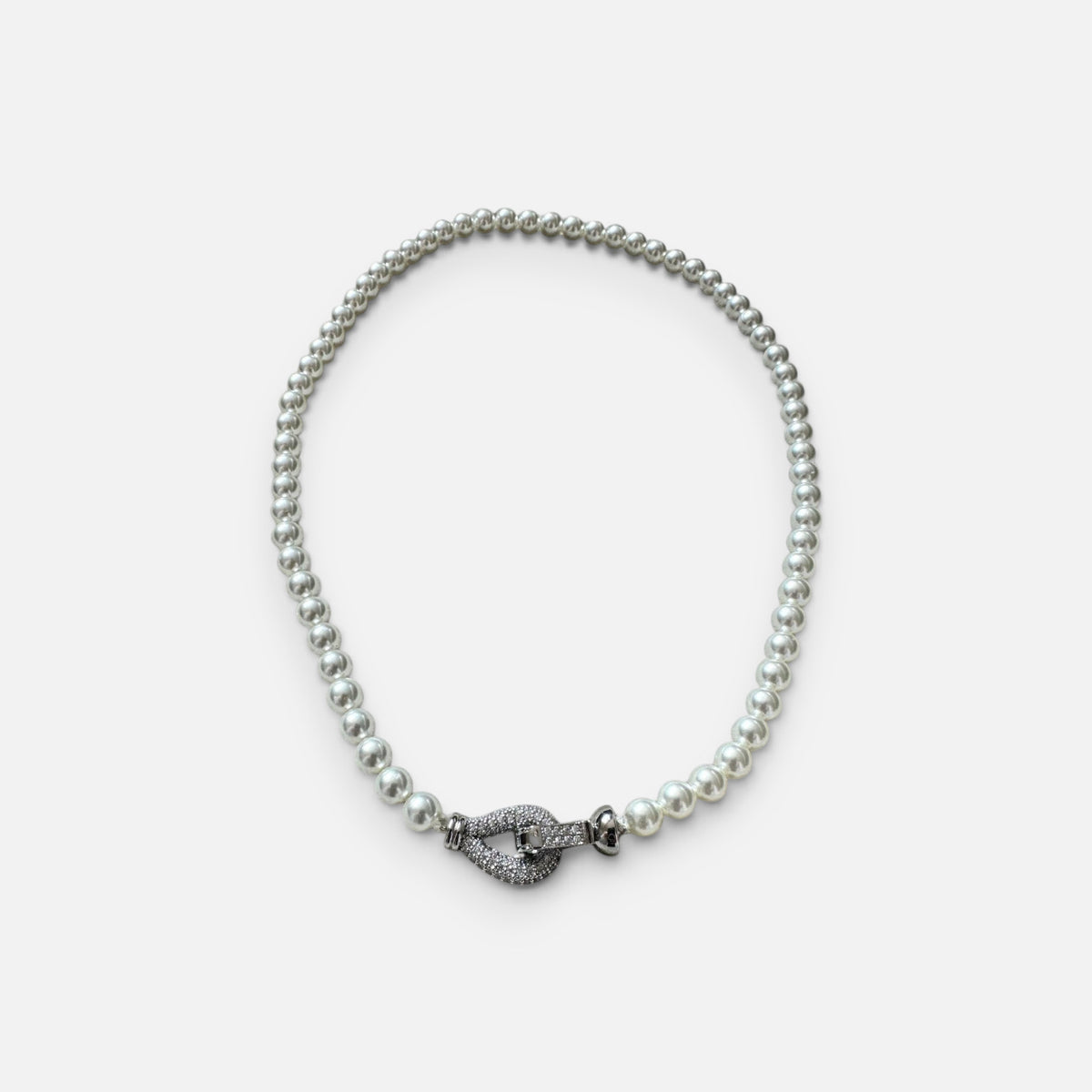 Jakris freshwater pearl bridal choker necklace featuring a sparkling zircon stone clasp detail on a white background.