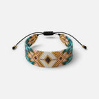 Jakris woven bead bracelet featuring a geometric pattern in turquoise, gold, pink, and white with adjustable cord.