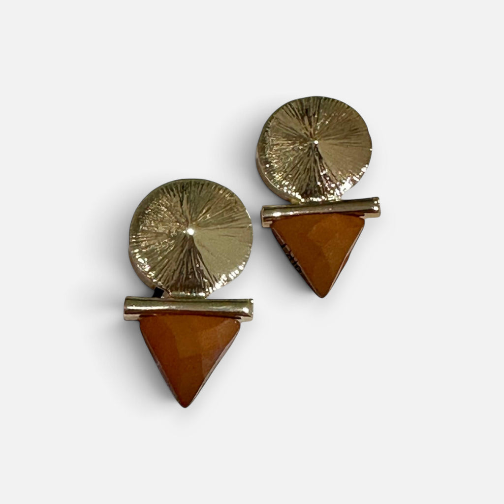 Jakris modern geometric earrings featuring gold-plated textured discs and brown triangular stone accents.