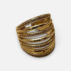 Jakris gold multi-band ring featuring sparkling crystal embellishments on a wide, elegant statement design.