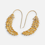 Jakris 24k gold-plated feather earrings with a detailed textured design, lightweight and elegant for formal wear.