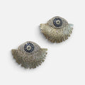 Jakris gold-plated fringe earrings featuring a blue evil eye nazar bead design with sparkling stone accents.