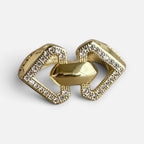 Jakris adjustable gold-tone geometric ring featuring a chain-link design with sparkling crystal accents.
