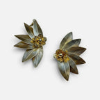 Jakris gold plated brass leaf-shaped earrings with central flower detail and textured finish for formal occasions.