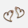 Jakris minimalist open heart stud earrings in polished gold, featuring a sleek and elegant design.