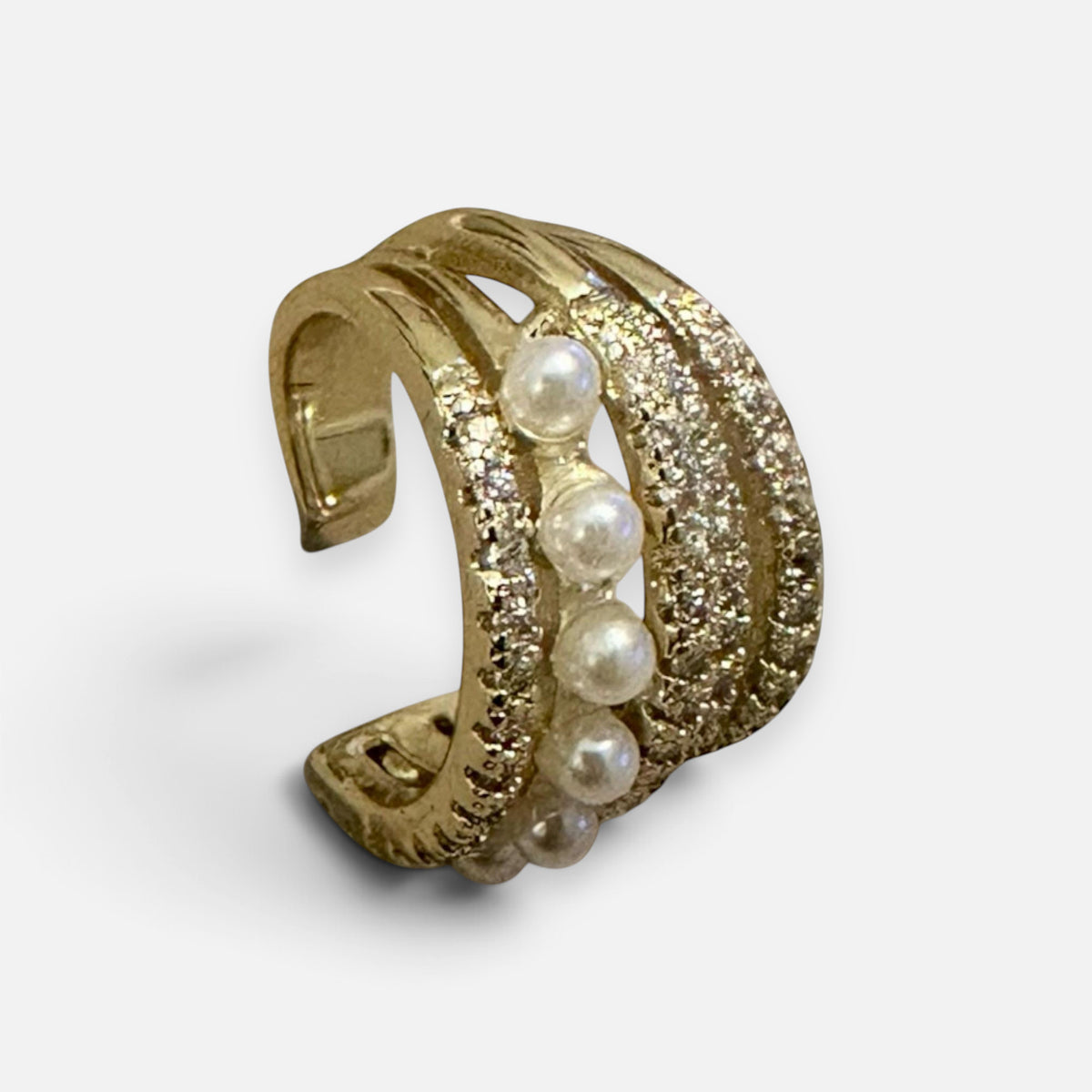Jakris gold-tone non-pierced ear cuff featuring a row of white pearls and sparkling crystal accents