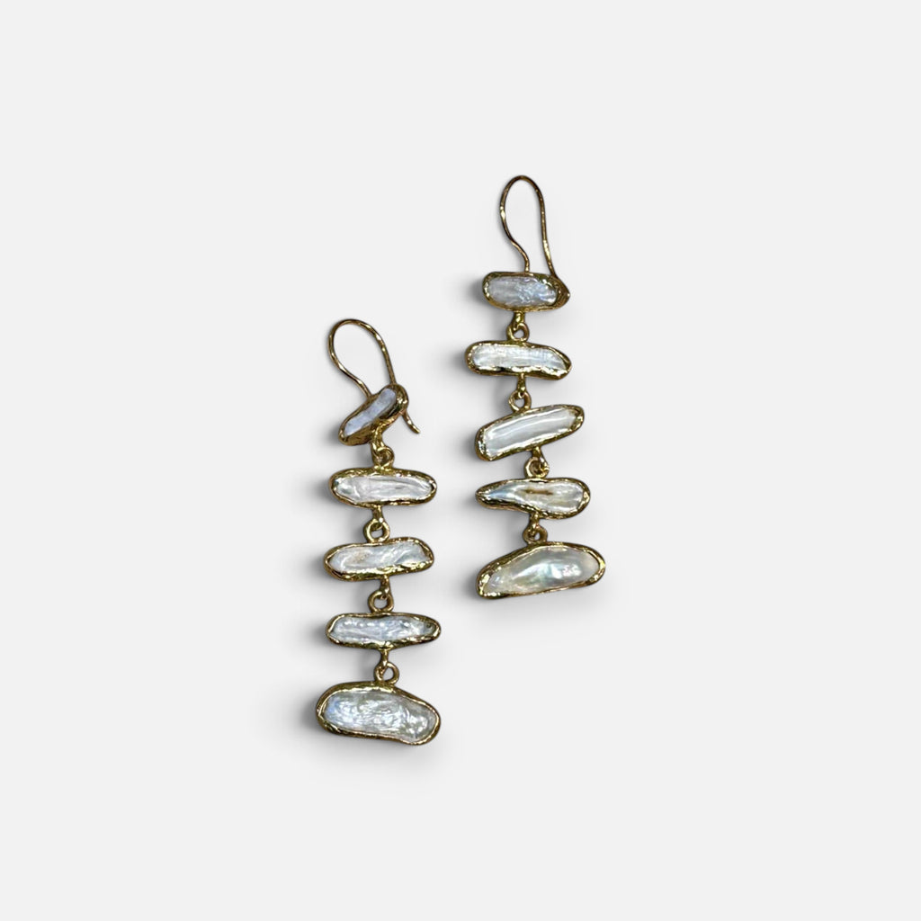 Jakris gold drop earrings featuring multiple irregular white pearls in a minimalist bridal design