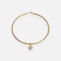 Jakris gold-plated choker necklace featuring a delicate round solitaire pendant on a minimalist metal band
