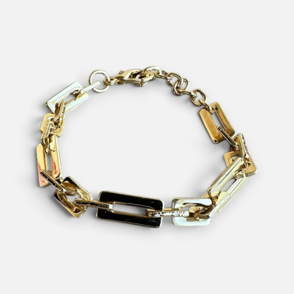 Jakris gold-tone geometric rectangular link chain bracelet with a polished finish on a white background