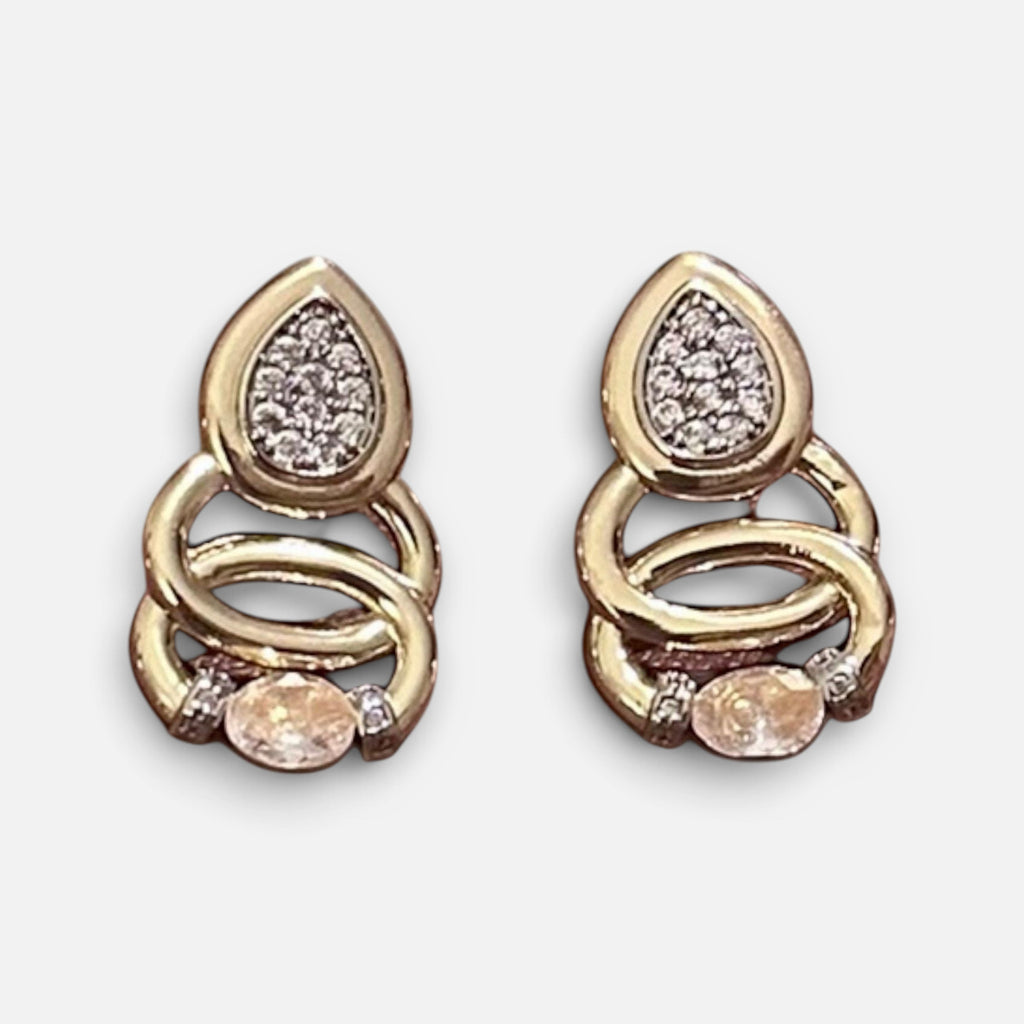Jakris elegant teardrop earrings in gold with sparkling pave stones and interlocking circular design