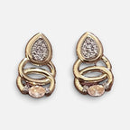 Jakris elegant teardrop earrings in gold with sparkling pave stones and interlocking circular design