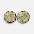 Jakris round earrings featuring woven straw centers and gold-plated brass frames for a natural summer style.