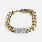 Jakris gold-plated chunky chain bracelet featuring a central section encrusted with sparkling white zircon stones.