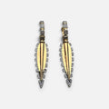 Jakris gold-plated long drop earrings featuring intricate zircon stone detailing on a white display stand.