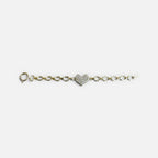 Jakris gold chain bracelet featuring a central heart charm encrusted with sparkling zircon crystals.