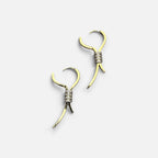 Jakris elegant gold drop earrings featuring a ribbon design with sparkling zircon stone accents