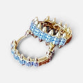 Jakris gold hoop earrings featuring sparkling zircon crystals and edgy pointed spike details