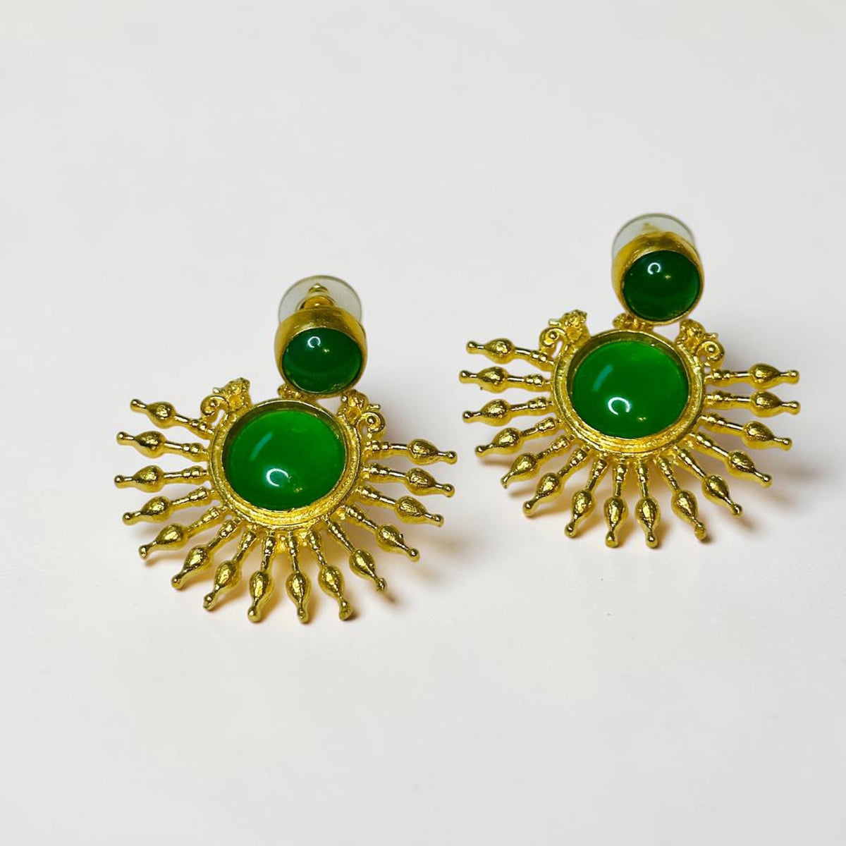 Jakris green onyx stone drop earrings with 24k gold plated sunburst design on a white background