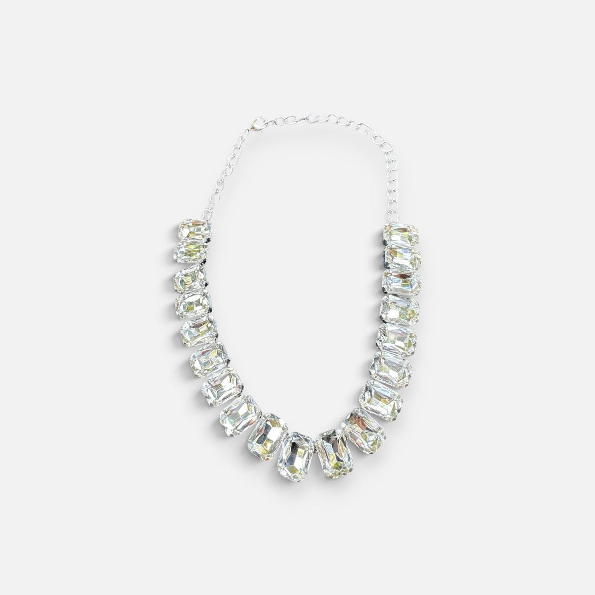 Jakris Liora choker necklace featuring large emerald-cut crystals with a silver-tone finish and adjustable chain.