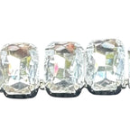 Jakris Liora choker necklace featuring large emerald-cut clear crystals set in a silver-toned metal frame.