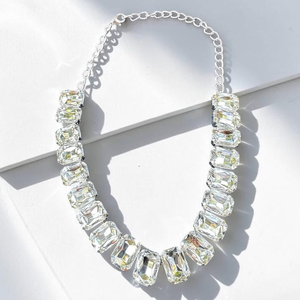Jakris Liora choker necklace featuring large emerald-cut clear crystals set in a silver-toned adjustable chain.