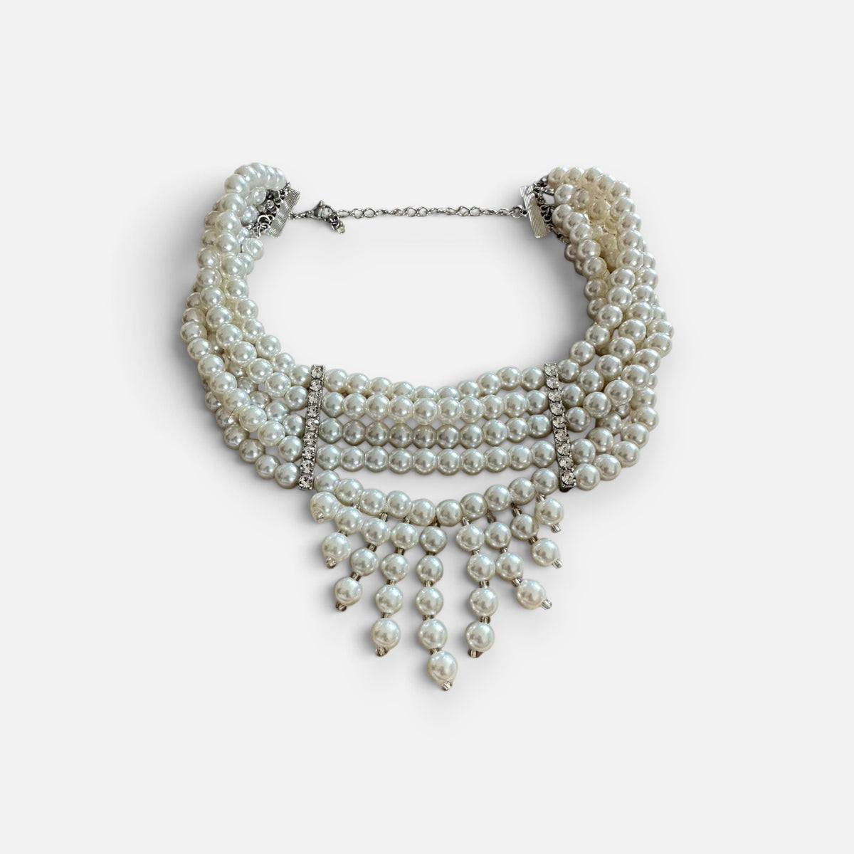 Jakris multi-strand pearl choker necklace with crystal accents, perfect for bridal or formal wear.