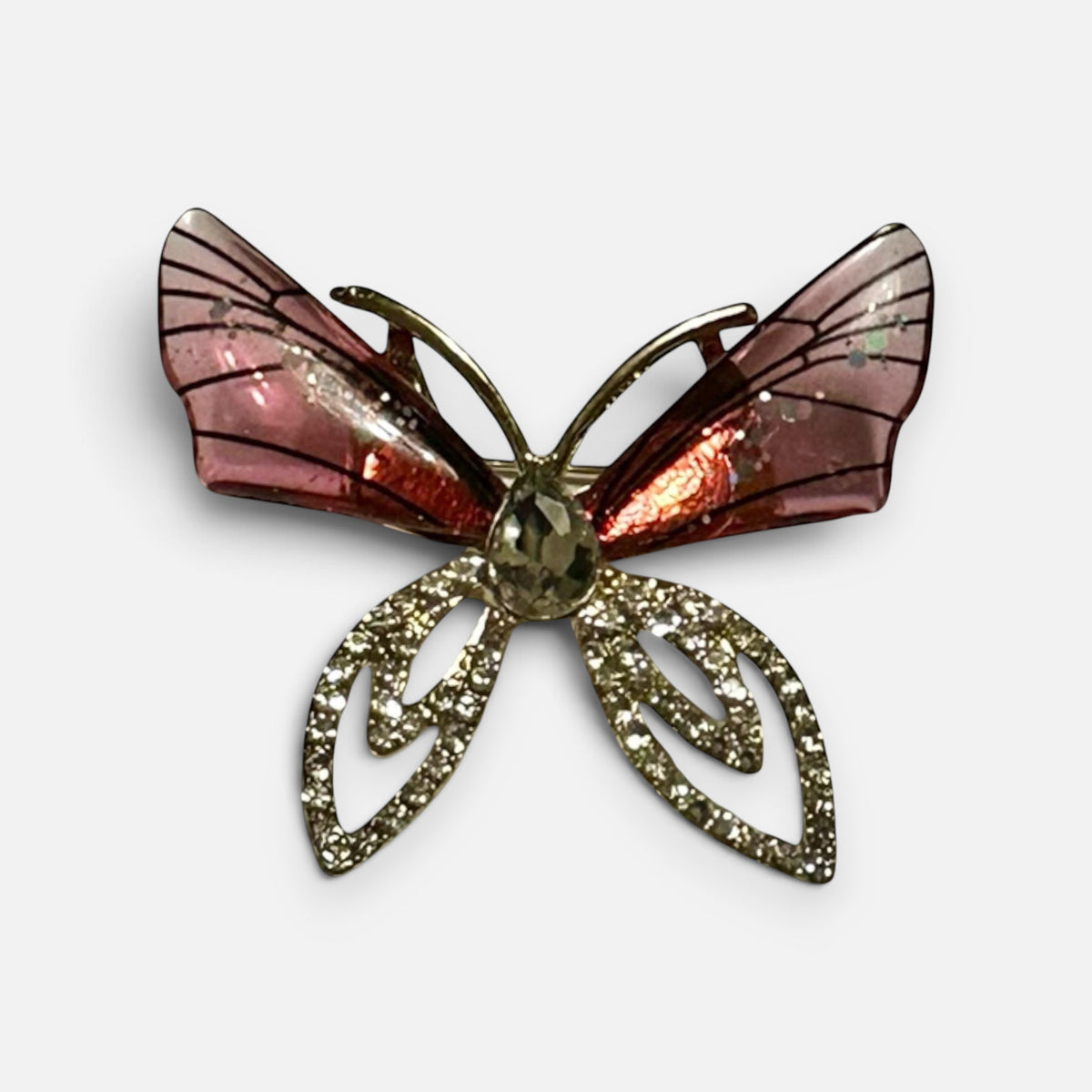 Jakris elegant butterfly brooch featuring pink translucent wings and gold-tone crystal embellished lower wings