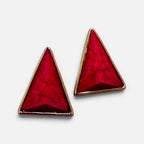 Jakris modern triangle earrings featuring vibrant red stone inlay with a polished gold-tone metal frame