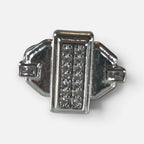 Jakris silver-tone geometric pinky ring featuring a rectangular center with sparkling crystal accents.