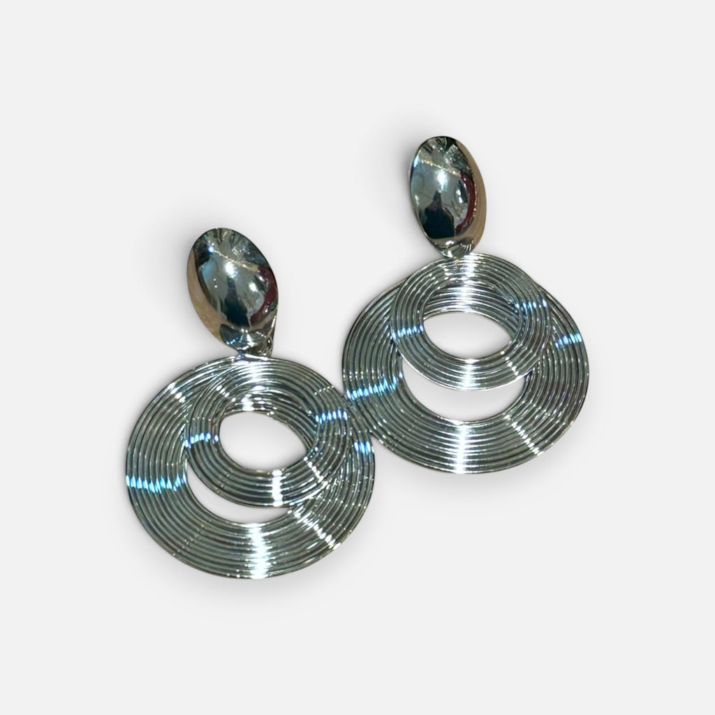 Jakris modern silver spiral dangle earrings with circular layered design